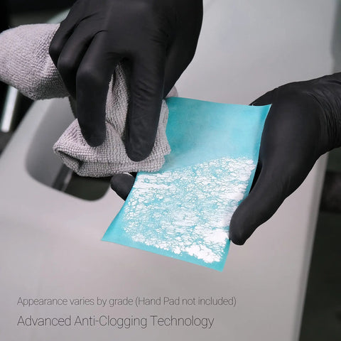 Flexible Sanding Sheets Peach K1500 Hook And Loop 191 2505 25 Sheets Pack in use with gloves and cloth for anti-clogging.