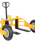 Heavy Duty All Terrain Steel Pallet Truck With Pneumatic Tires And Smooth Steering Glides Over Rough Ground Loads Up To Two Thousand Five Hundred Pounds Without A Sweat On Thirty Two Inch Forks, yellow with large pneumatic tires.