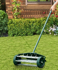 Heavy Duty 18 Inch Rotary Spike Lawn Aerator with 41 Inch handle in use on a lawn, showing steel spikes and lightweight design