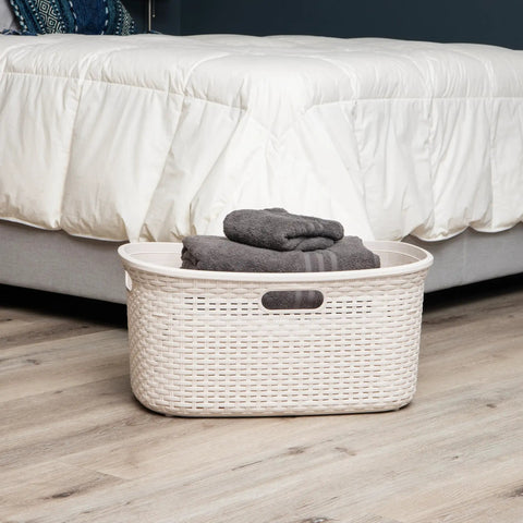 40L Laundry Basket With Lightweight Build And Premium Wicker Look Ivory Plastic Hamper in bedroom next to bed