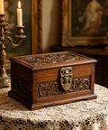 Vintage wood jewelry box with detailed carvings and lock, showcasing Retro Iron Suitcase Hinges 4 Pack With Installation Screws.