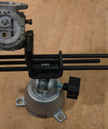 Wide Opening 6 Inch Jaw Vise For PC Boards And Large Objects With Neoprene Grip Pads holding metal object on wooden surface