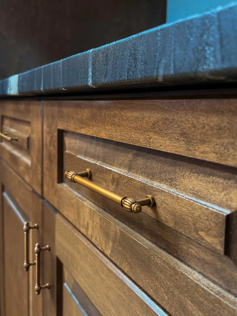Side view of kitchen cabinet with Six Pack Antique Brass Cabinet Pulls in Zinc Alloy for Kitchen and Furniture, 5.04 Inch Center To Center 128mm