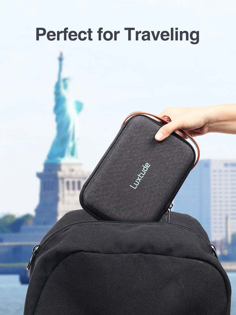 Hand holding The Ultimate Go To Tech Organizer Travel Case For Portable Electronics And Daily Cord Management Featuring A Smooth Leather Handle Compact Fit that fits in a backpack.