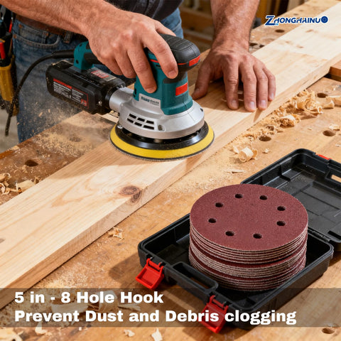 Person using orbital sander with 200 Pcs 5 Inch Sanding Discs Hook and Loop Orbital Sander Pads Set With Grits From 40 To 1000.