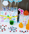 208 Piece Molecular Model Kit For Organic Chemistry with atom and bond builder components on colorful science-themed table
