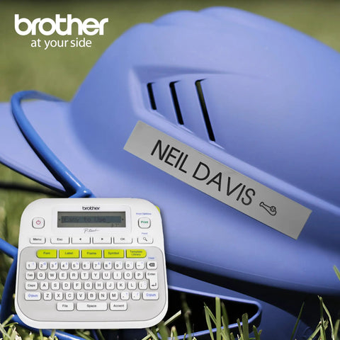 Top Shelf Monochrome Label Maker With No Brainer Setup And Dozen Smart Templates For Fast Home Office Organization printing name labels on a blue hard hat.