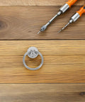 Ten Pack Silver Metal Ring Drawer Pulls With Single Hole Vintage Style Drop Ring Knobs for dressers and cupboards shown with tools