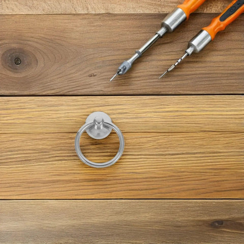 Ten Pack Silver Metal Ring Drawer Pulls With Single Hole Vintage Style Drop Ring Knobs for dressers and cupboards shown with tools