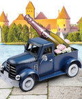 Farmhouse Blue Truck Tabletop Decor with champagne and flowers on a patio