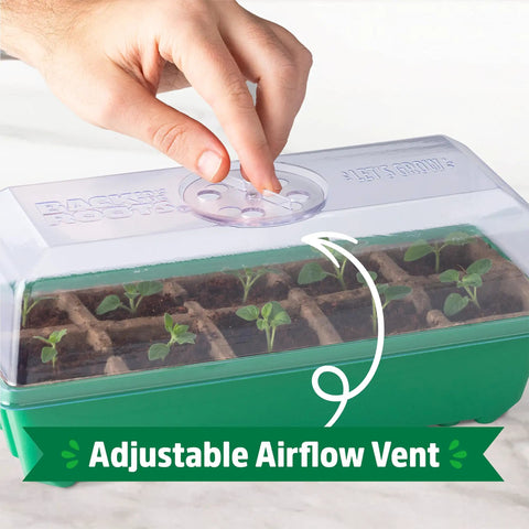 Hand adjusting vent on 10-Cell Greenhouse Germination Kit for Home Gardens With Biodegradable Pots and Vented Lid, Made From 75 Percent Recycled Plastic
