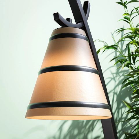 Detail of Wright 1 Light Table Lamp in Oil Rubbed Bronze Finish with amber shade in home office setting