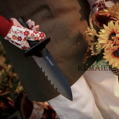 Heavy Duty Serrated Metal Detecting Shovel With Belt Mount Sheath in use, showing ergonomic non-slip handle and serrated edge.