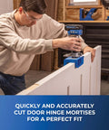 Person using Adjustable Door Hinge Routing Jig With Depth Guide For Precise Mortises And Accurate Latch Routing on interior door.