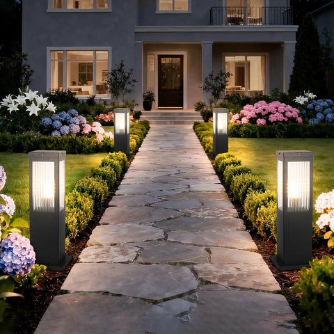 Heavy Duty Outdoor Path Light 15.75 Inches Modern Landscape Bollard with warm glow illuminating garden walkway at night.