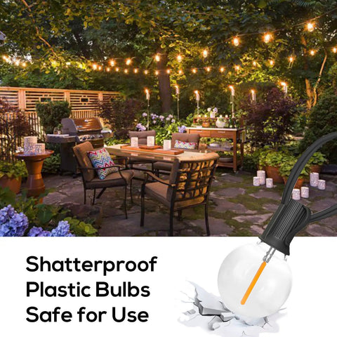 100 Ft G40 Globe Outdoor String Lights With 50 Dimmable Shatterproof Bulbs illuminating a cozy patio setup at night.