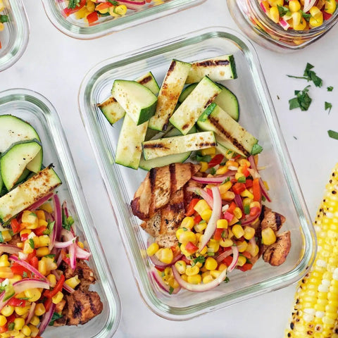 24 Piece Glass Food Storage Set With Airtight Lids, Leakproof BPA Free Meal Prep Containers with grilled chicken and vegetables