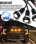 Dope Three Piece LED Front Grille Marker Lights With Projector Lens Assembly, waterproof IP68, on SUV in rain, amber glow