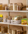 Water Hyacinth Wicker Storage Baskets For Organizing On Shelves And In Pantry White Two Pack Perfect For Towels Snacks Laundry Supplies Bins Eleven And A Quarter By Seven And A Half By Three And A Half Inches on pantry shelf with assorted snacks and jars