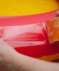 Applying Crystal Clear Heavy Duty Duct Tape For Repairs And Sealing Weatherproof And Air Tight Wide Two Point Eight Three Inch