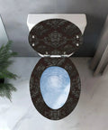 Elongated Gothic Resin Toilet Seat for Bathroom with intricate patterns, fitting most 40-47cm toilets, overhead view.