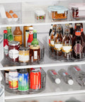 Clear Rectangular Lazy Susan Organizer For Refrigerator 13.5 By 8.5 Inches With 360 Degree Turntable holding condiments in fridge