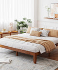 Rock Solid King Platform Bed Frame 14 Inch Profile Genuine Rubber Wood Heavy Duty Slat Support Premium Mattress Foundation No Box Spring Needed Hassle Free Setup Dark Walnut in a stylish bedroom.