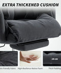 Close-up of extra thick cushion on Executive Office Chair With Foot Rest For All Day Comfort, dark gray fabric, padded armrests.