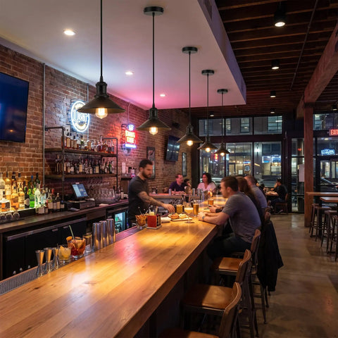 Interior of a bar featuring Harwez Matte Black Industrial Vintage Mini Pendant Light Kit E26 LP-0661 above the counter.