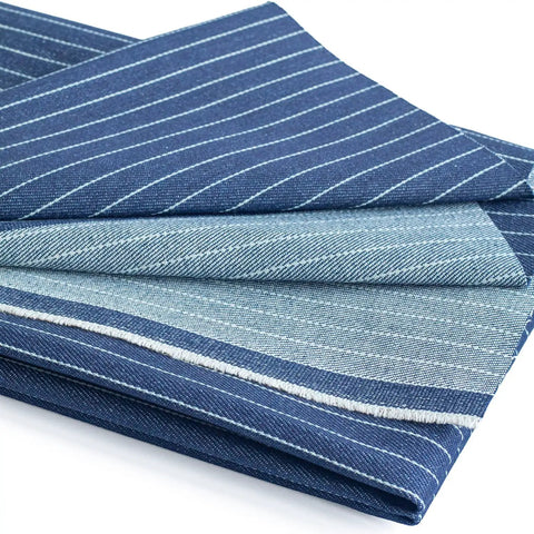 Heavyweight Dope 12.4 Oz Raw Denim Fabric With Dark Blue Stripe 63 Inch Wide 100 Percent Cotton Non Stretch For Jeans Jackets And DIY Sewing Three Yard Pre Cut folded on a white background.