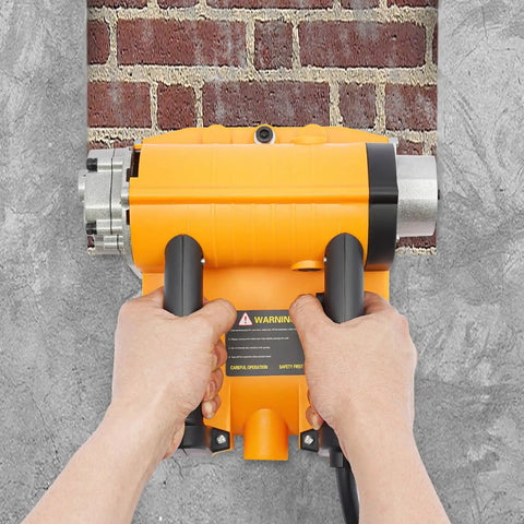 Rugged Workhorse Electric Wall Planer And Handheld Power Scraper Featuring Quick Adjust Depth Dial, close-up of orange power tool hands-on, for indoor remodeling.