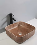 Bathroom Sink Bathroom Sink Modern Art Basin Hotel Apartment Bathroom Wash Basin Square Above Counter Basin Home Bathroom Wash Basin Bathroom Sink Vessel in brown finish on countertop.
