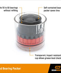 Hand Bearing Packer For Quick Grease Loading Holds Fifty To Sixty Bearings Per Fill Transparent Cup Lets You Check Grease Level Fits All Cage Type Roller And Ball Bearings Up To Two Inch Bore Self Contained Packer For On The Go Use shown in black and red with transparent cup.