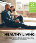 Happy couple enjoying a healthy living space on Heavy Hitter Underlayment Roll For Luxury Vinyl Plank Laminate And Engineered Wood Floors Sound Blocking Dense Comfort 50 Square Foot Spool.