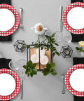 Table setting with 48 Pack Red And White Checkered Disposable Paper Plates For Backyard Kickbacks, elegant dining decor.