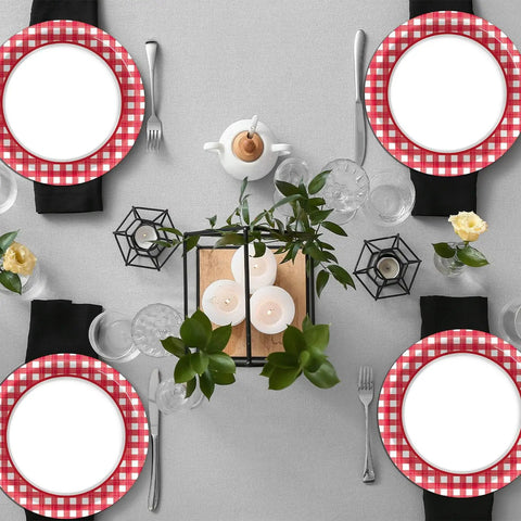 Table setting with 48 Pack Red And White Checkered Disposable Paper Plates For Backyard Kickbacks, elegant dining decor.