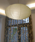 Set Of 2 16 Inch Oval Paper Lanterns Rice Paper Lamp Shades For Home Decor Weddings Parties Bridal Showers Garden And Holidays Easy To Assemble Hanging Lights For Warm Ambient Glow hanging in living room