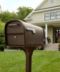 Oasis 360 Locking Parcel Mailbox With Two Access Doors, X Large Rubbed Bronze Finish, outdoors in front of a house