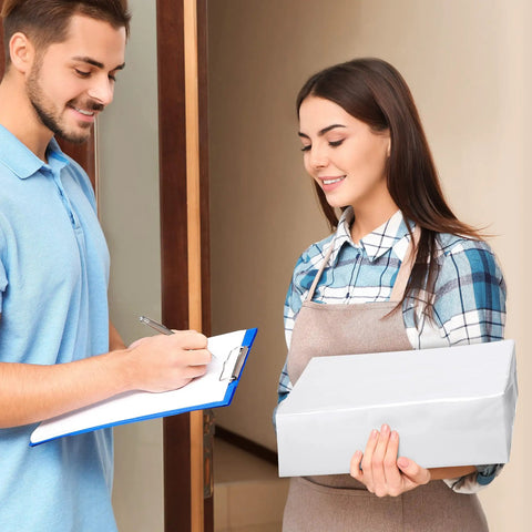 Delivery personnel handing a package wrapped in a white poly mailer to a customer, showcasing the use of waterproof shipping bags.