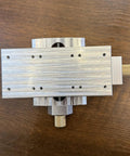 Hella Precise Cross Slide Table Fine Adjustment Hand Crank Screw Mechanism Xy Axis Micro Positioning Tool Compact Aluminum Machine Tool Station For Precision Milling Tasks, overhead view of aluminum plate.
