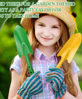 Girl holding Mini Colorful Metal Hand Shovel Set 12 Pcs Transplanting Trowels 11 X 3 Inch Garden Tools 6 Colors