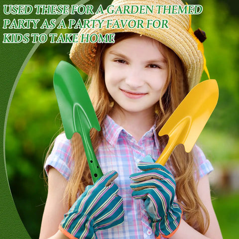 Girl holding Mini Colorful Metal Hand Shovel Set 12 Pcs Transplanting Trowels 11 X 3 Inch Garden Tools 6 Colors