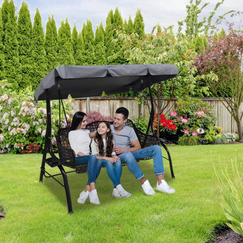 Family sitting on 3 seater porch swing with Heavy Duty Patio Swing Canopy Replacement Cover, Grey, in garden