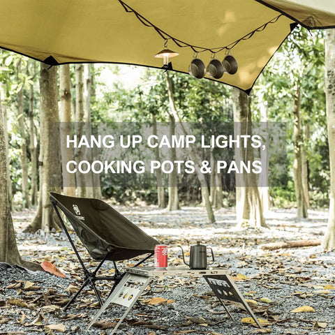 Camping scene with Heavy Duty Camping Lanyard Ten Feet With 19 Loops Daisy Chain Gear Hanger suspending cookware and lanterns.