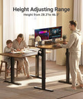 Claiks Electric Height Adjustable Standing Desk 40 By 24 Inches Rustic Brown Ergonomic Home Office in use with a man and child.