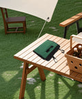 Chef Knife Roll Bag For Outdoor Cooking And Camping Portable Cutter Carrier with handle on wooden table outdoors