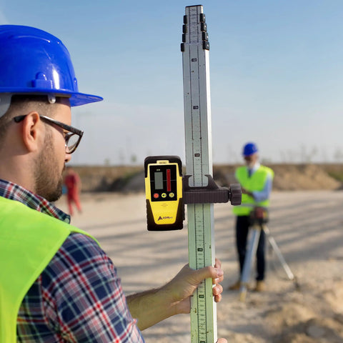 Worker using Digital Rotary Laser Detector With Dual Display And Built In Bubble Level For Most Red Rotary Lasers on job site