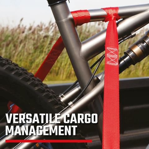 Straight Shooter 10 Piece Ratchet Strap Kit With Soft Loops And Stretchy Bungee Cords Heavy Duty Cargo Securing Set With Storage Bag Comfort Handle Smooth Use For Weekend Warriors Truck securing a bicycle frame in a truck bed.