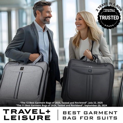 Two professionals carrying business travel garment bag at airport