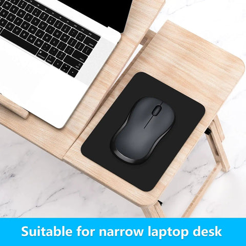 Small Mouse Pad 8 By 6 Inch Thick Rubber With Premium Textured Non Slip Surface, Portable, on a wooden desk with laptop.